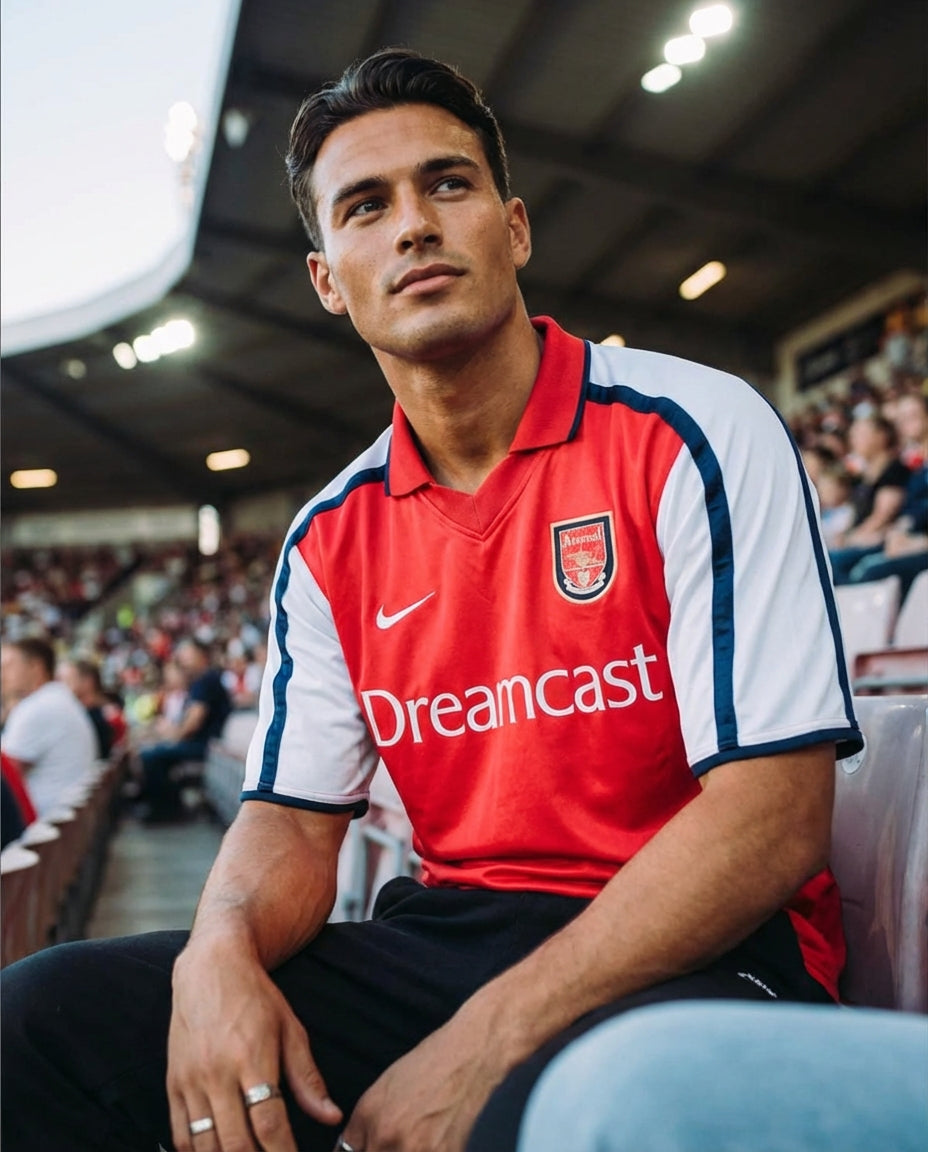 Vintage arsenal 1999 Dreamcast home jersey worn by fan in the stadium