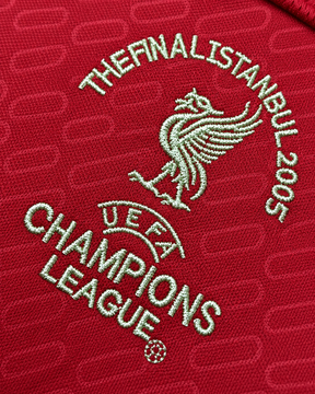 Close-up of Liverpool Istanbul 2005 Champions League Final chest embroidery on the 2004/05 home shirt